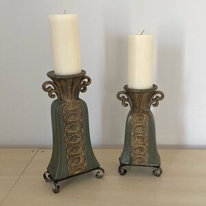 Pair of green and gold pillar candlestick holders. Heavy and with nice details